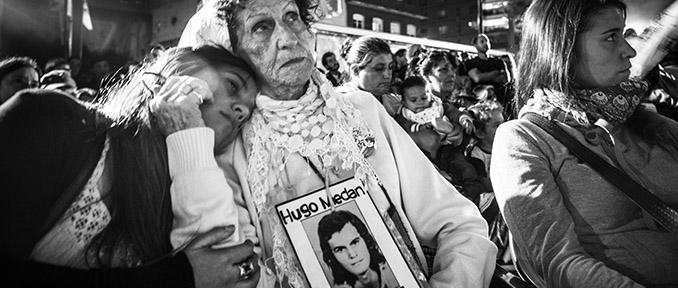 Particolare della locandina della mostra con l'attivista Elia Espen